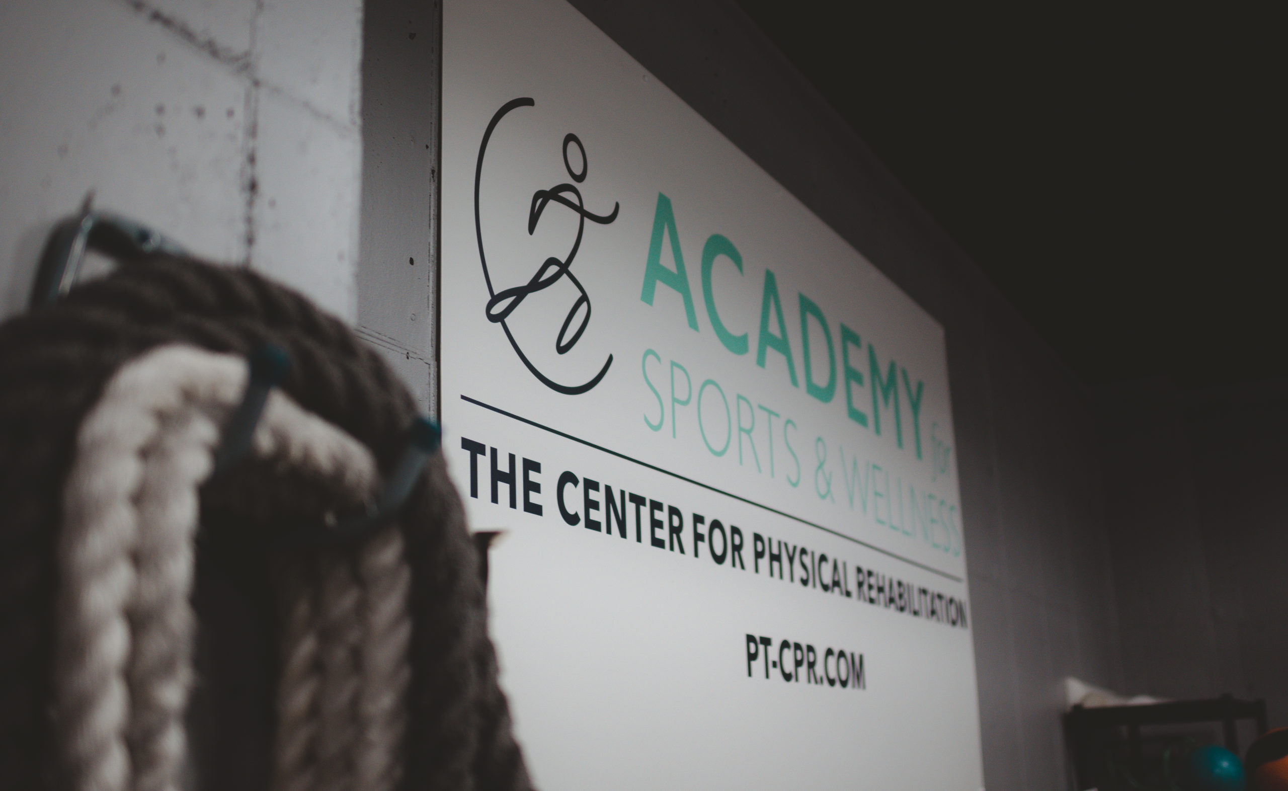 Academy for sports and wellness sign