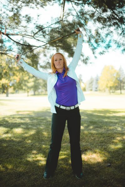 Woman doing golf stretch